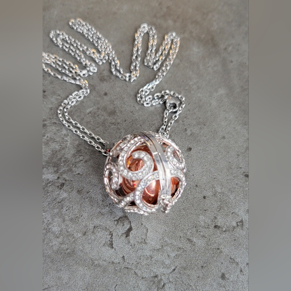 A classic Italian pendant called "The Angel Caller" with necklace